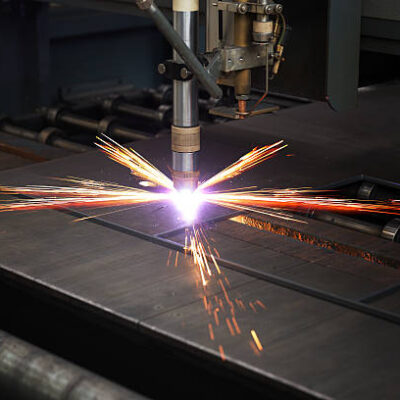 Industrial cnc plasma machine cutting of metal plate